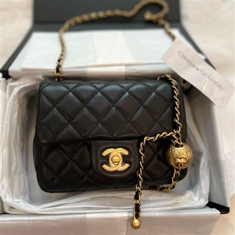 golden ball chanel|Chanel mini square.